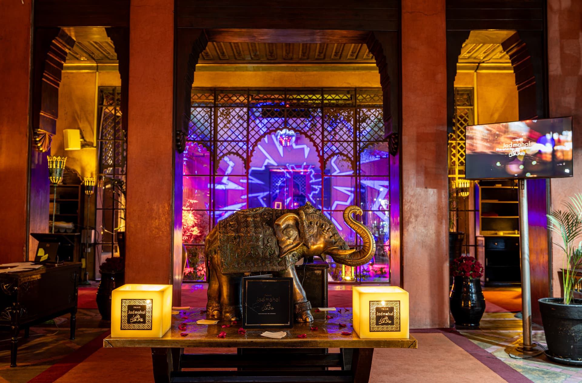 Ornate entrance hall with bronze elephant statue at Palais Jad Mahal Hivernage Marrakech